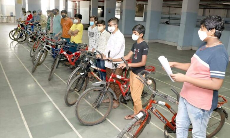 Bicycle gift to 21 students under 'Project Recycle'